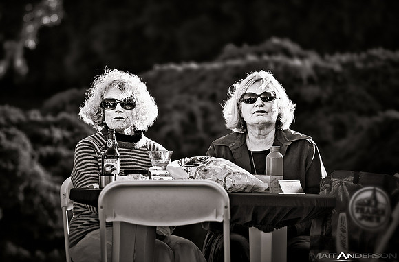 Two older women enjoying wine at a Jazz festival held in Sausalito California by Matt Anderson.  by matt anderson