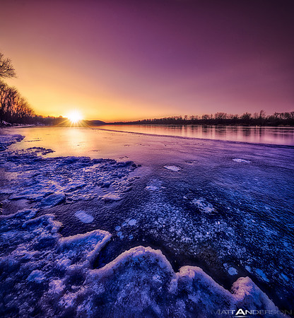 Sunset on an Icy Wisconsin River by Matt Anderson