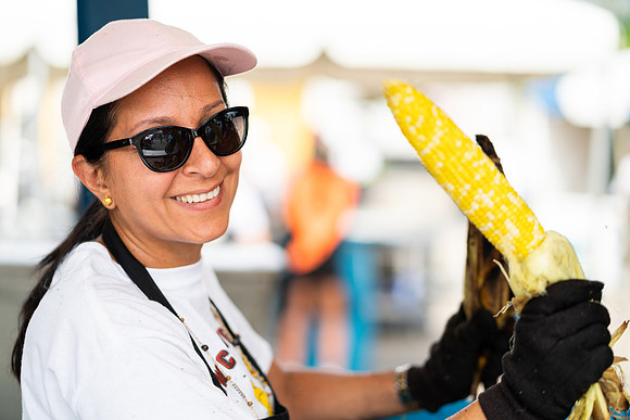Food Woman holding Sweet Corn